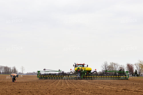 Farmers in Field with Planter 109005