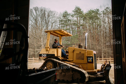 Farmer Running Bulldozer 169057