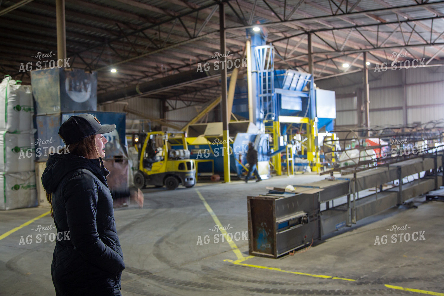Farmer Standing in Shed 130012