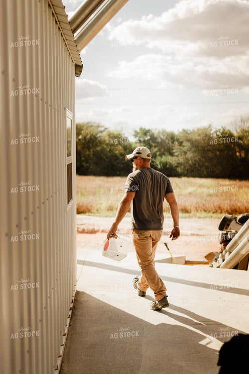 Farmer Checking Moisture of Stored Corn 9322