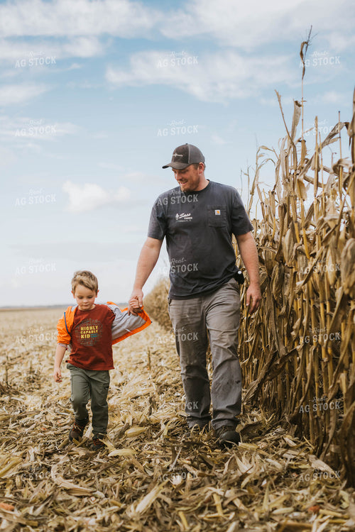 Farmer and Son Checking Corn 8536