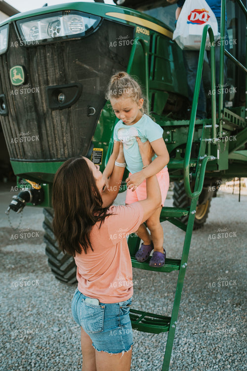 Farm Mom Helping Kids Down from Sprayer 6230