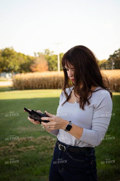 Female Farmer Flying Drone 268060