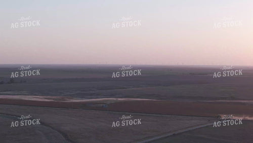 Aerial of Tractor Driving on Road 239026