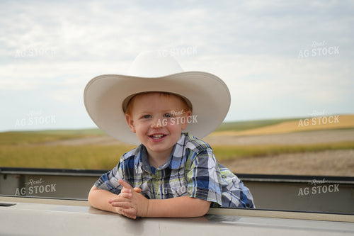 Farm Kid Wearing Hat 95000