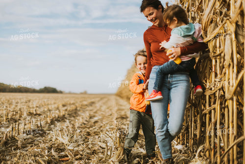 Female Farmer and Kids Playing in Cornfield 8521