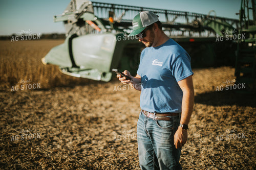 Farmer on Phone in Field 7137