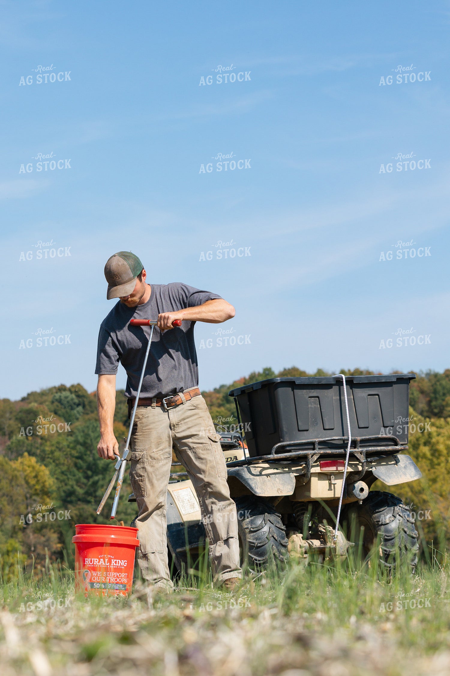 Farmer Taking Soil Samples 52799