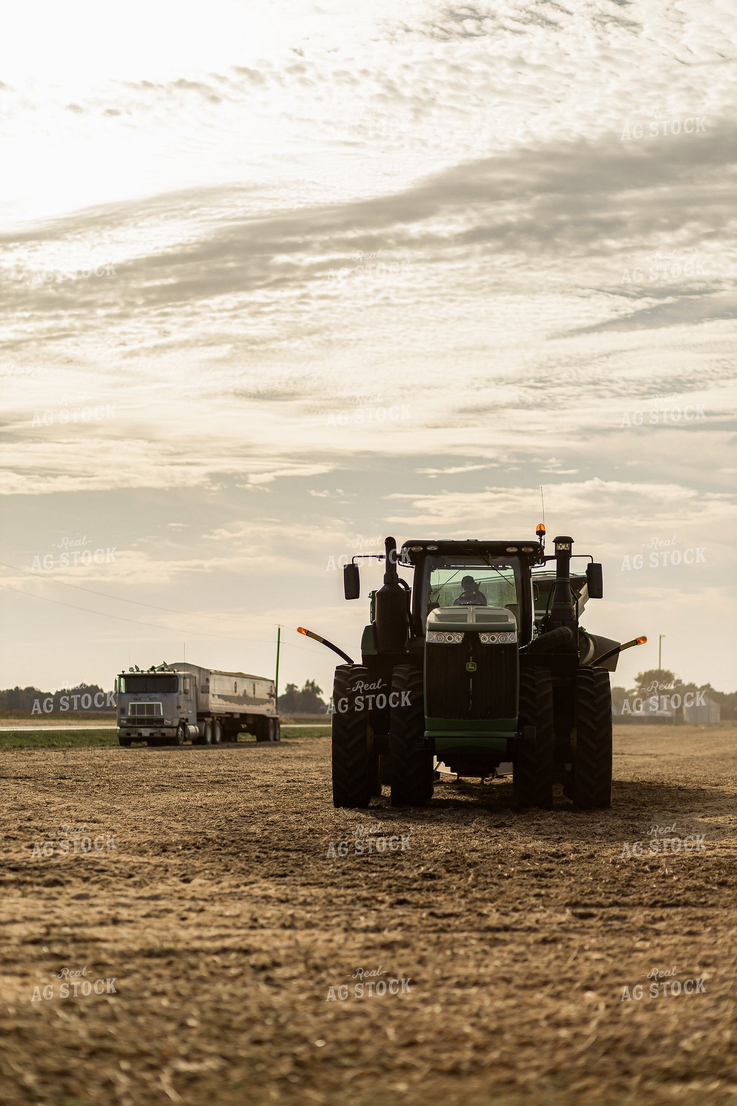 Tractor and Semi in Harvested Soybean Field 93326