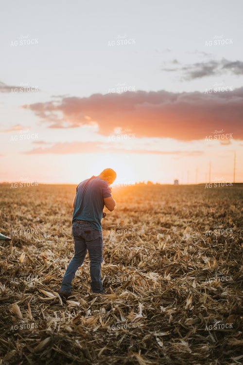 Farmer Walking in Field 9401