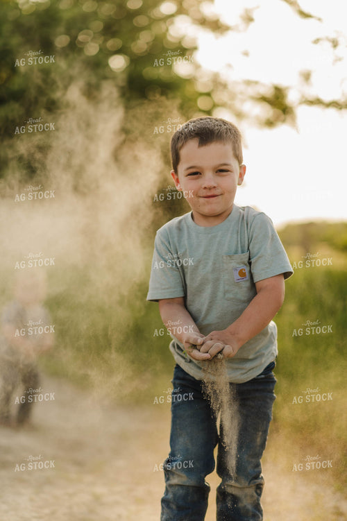Farm Kid Playing in the Dirt 115064