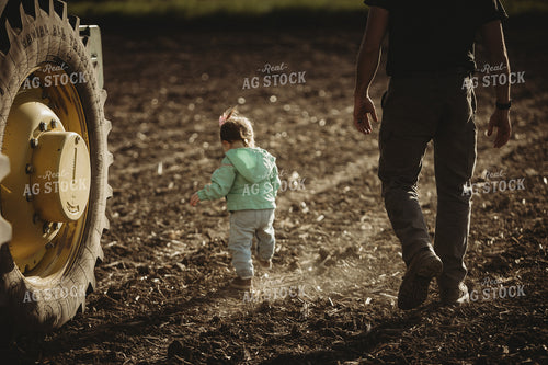 Farmer and Daughter in Field with Tractor 4207