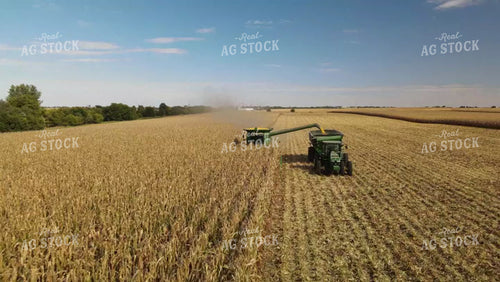 Aerial of Corn Harvest Combine Unloading 7377