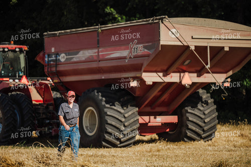 Female Farmer Walking by Tractor 115213