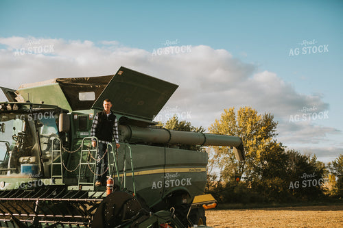 Farmer On Combine Ladder 6866