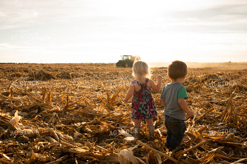 Farm Kids Watch Baling Corn Stalks 223008