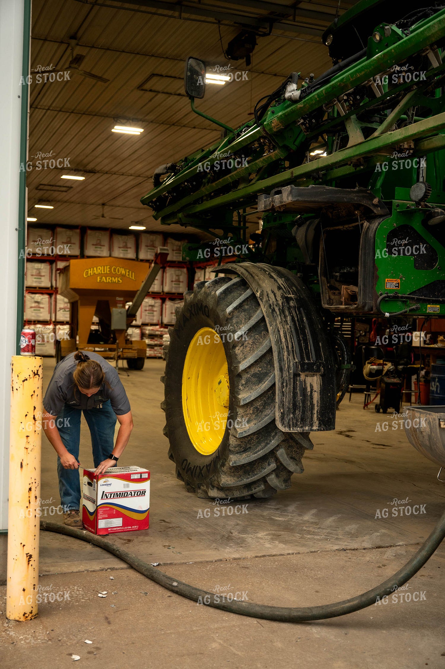 Farmer Filling Self-Propelled Sprayer 115739
