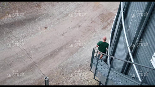 Farmer Climbing Grain Bin - 309