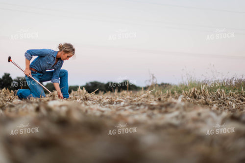 Female Farmer Taking Soil Sample 8384