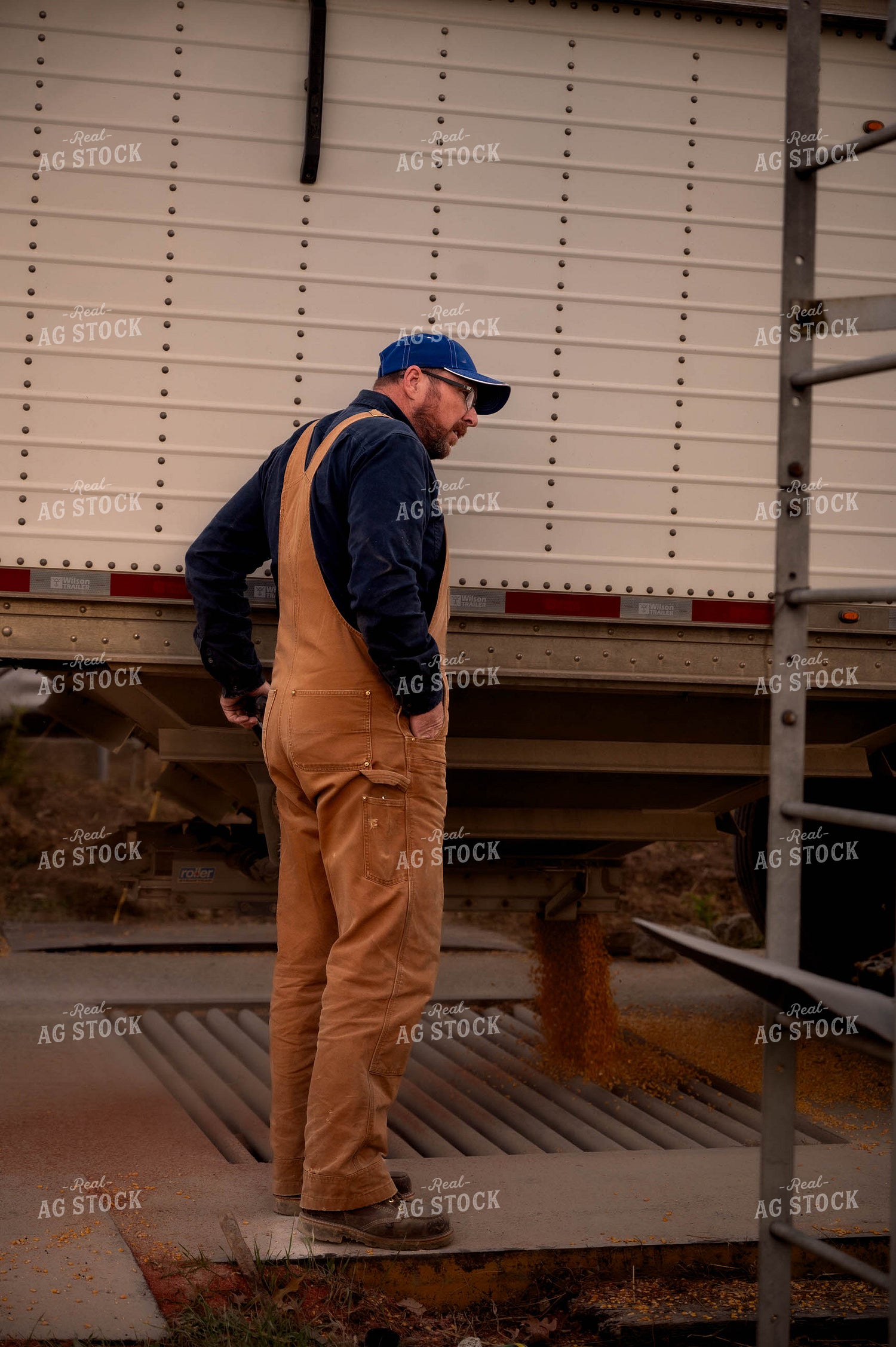 Farmer Unloading Semi 115506