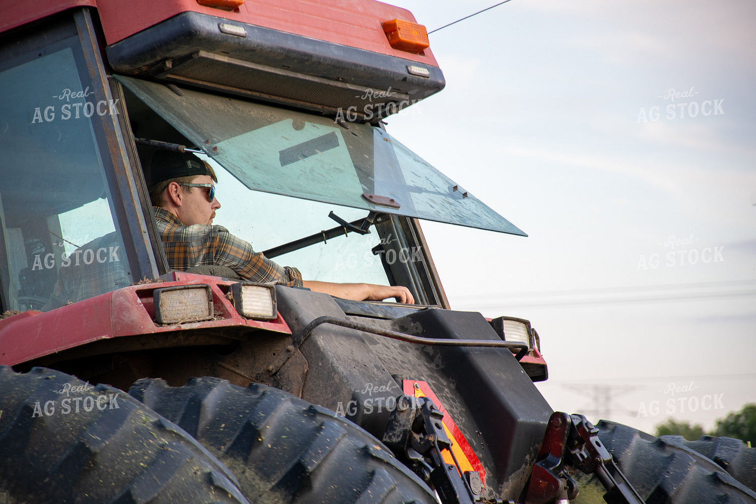 Farmer in Tractor 50232