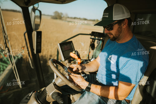 Farmer Operating Combine 7111