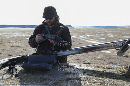 Farmer Setting Up Drone 117013