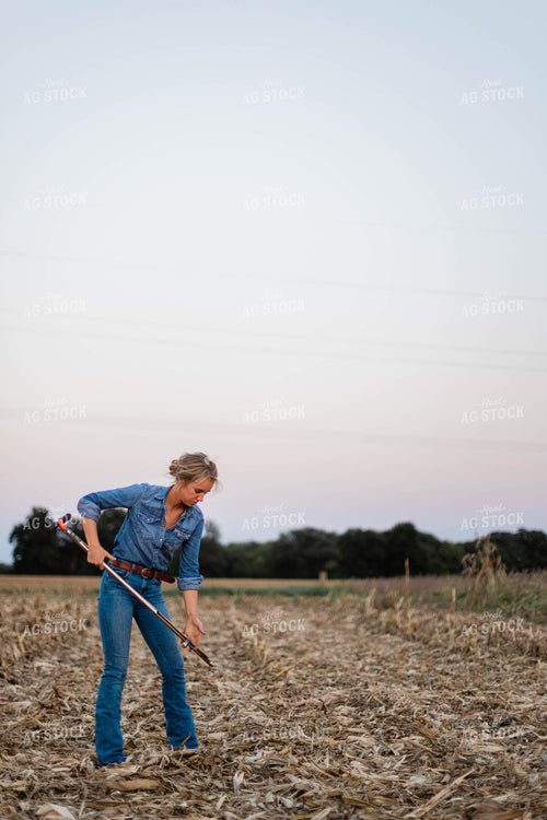Female Farmer Taking Soil Sample 8382