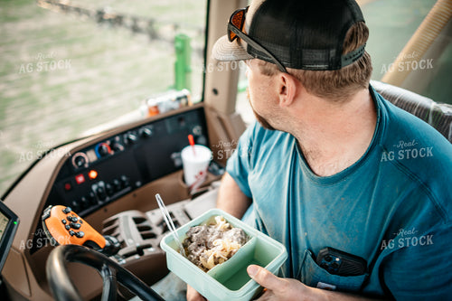 Farmer Eating a Meal in Sprayer 56607