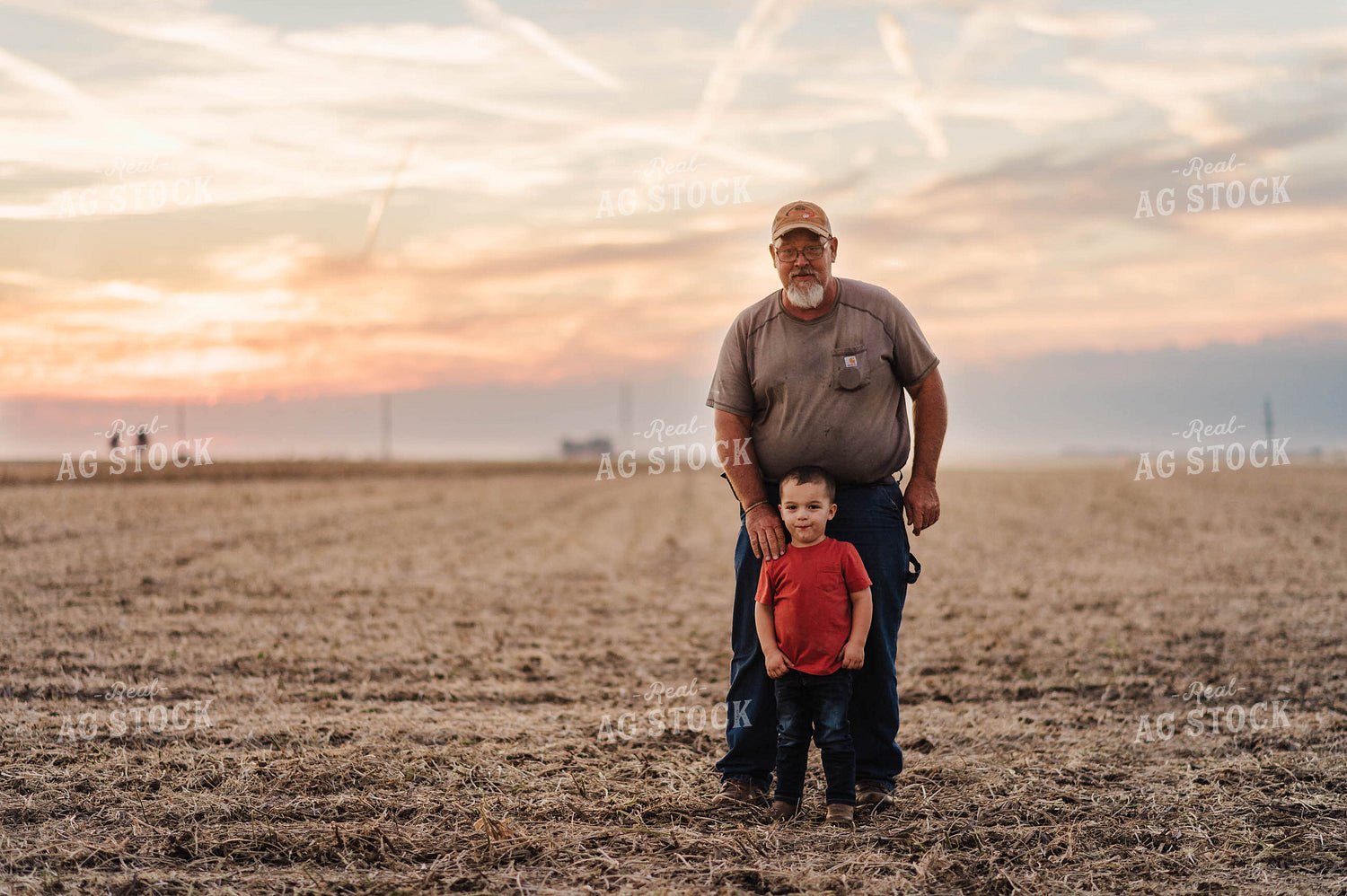 Farmer and Farm Kid in Field 115041