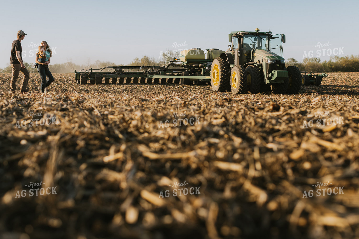 Young Couple with Child Walk Toward Tractor 7671
