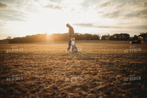 Farmer and Farm Kid Walking to Truck 4871