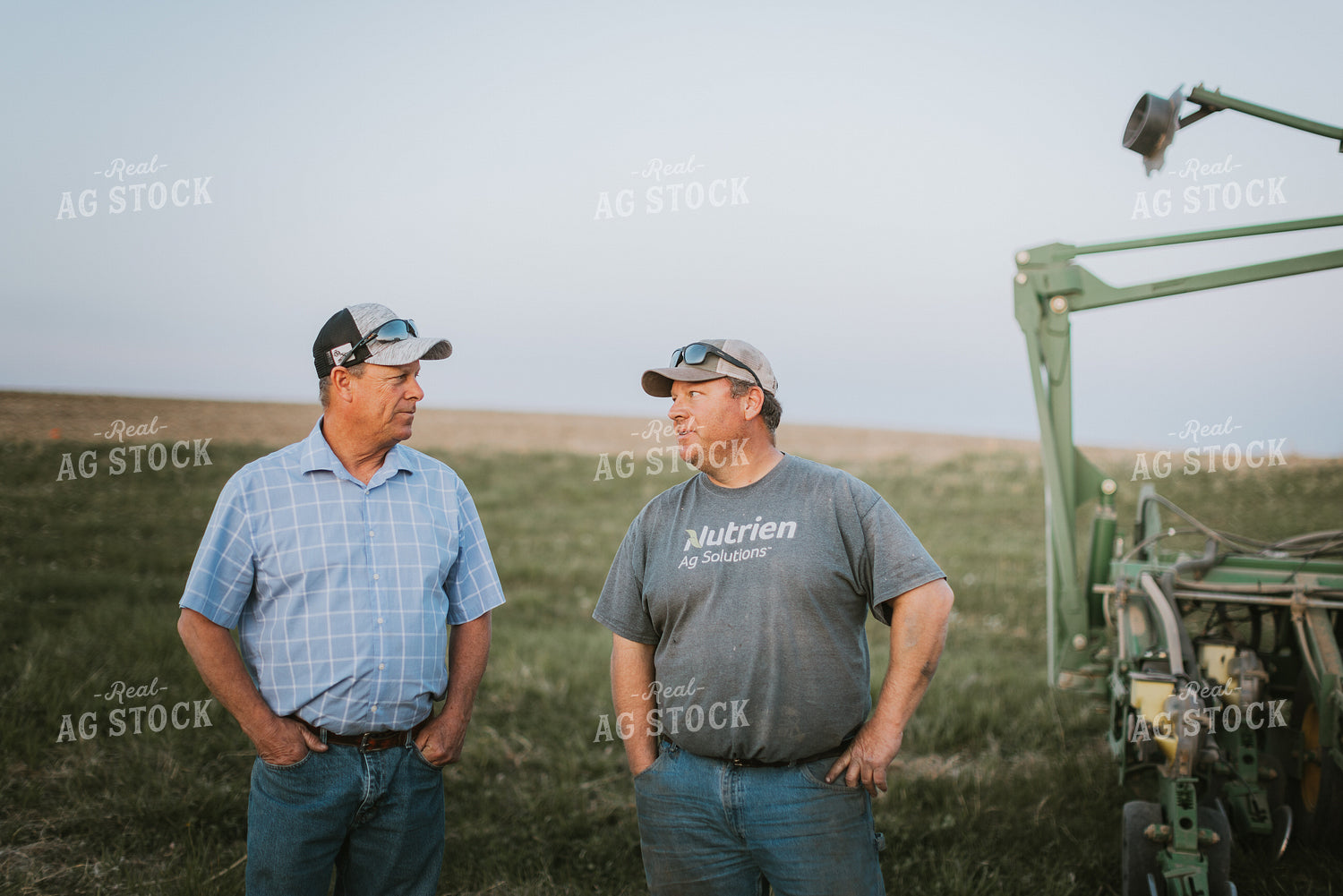 Farmers Talk Beside Planter 7738