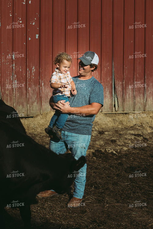 Farm Family Feeding Cows 3144
