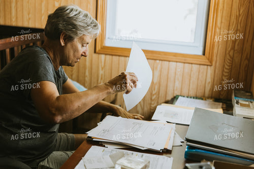 Female Farmer Does Bookwork 8121