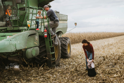 Farm Family Loading Kids into Combine 8561