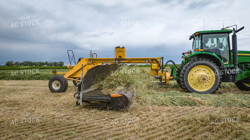 Tractor with Merger in Hay Field 56419