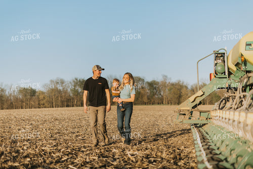 Young Couple with Child Walk Along Planter 7684