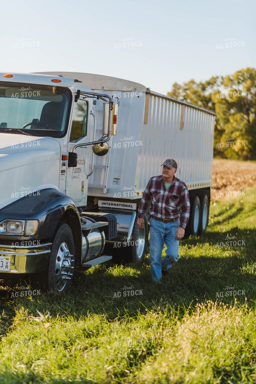 Farmer by Semi Truck 115126