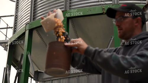 Farmer Testing Corn Moisture On-farm Storage - 468
