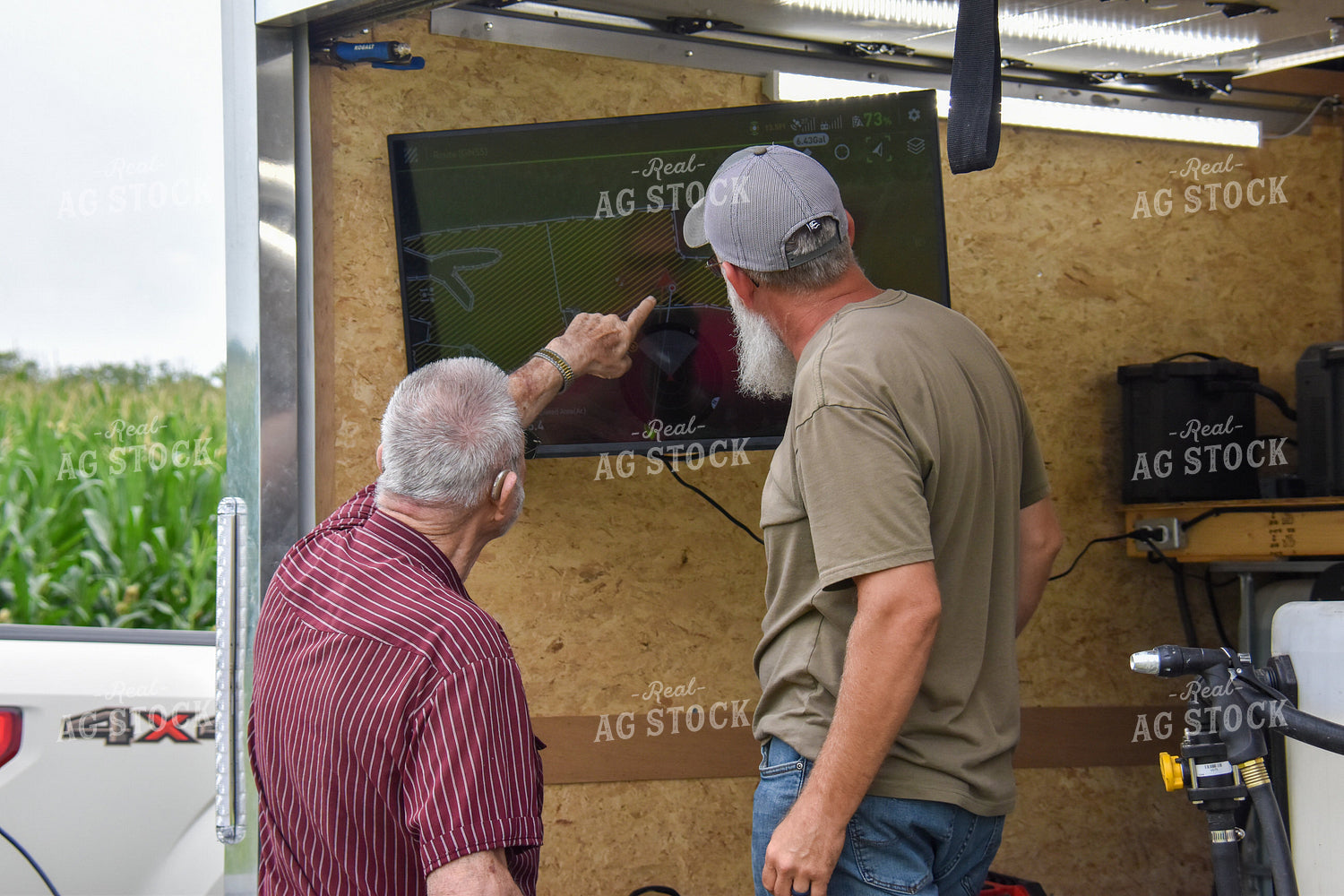Farmers Looking at Field Map 84127