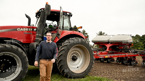 Farmer Climbing out of Planter 25147