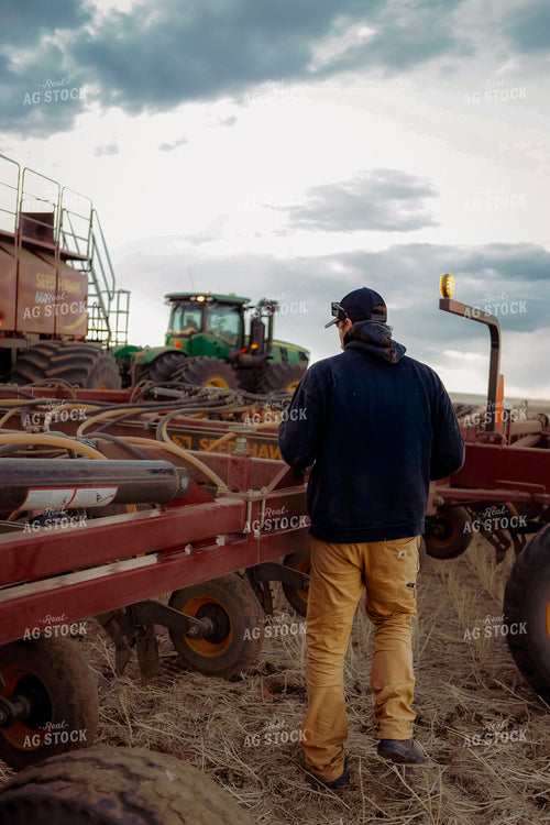 Farmer Checking Equipment 187379