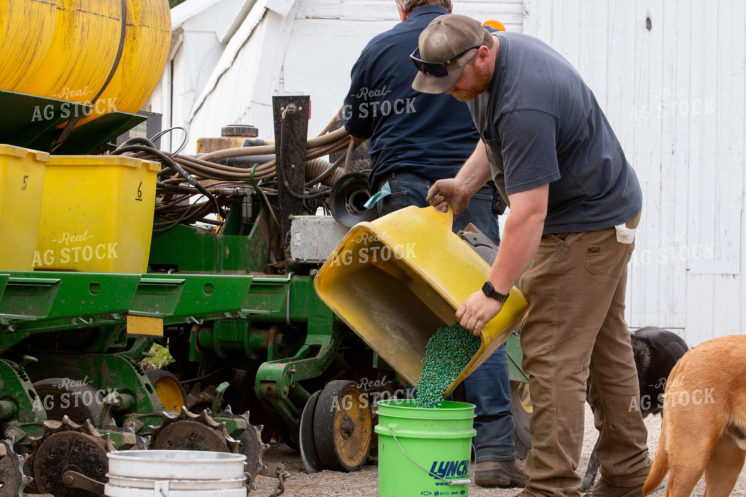 Farmers Cleaning Out Planter 157152