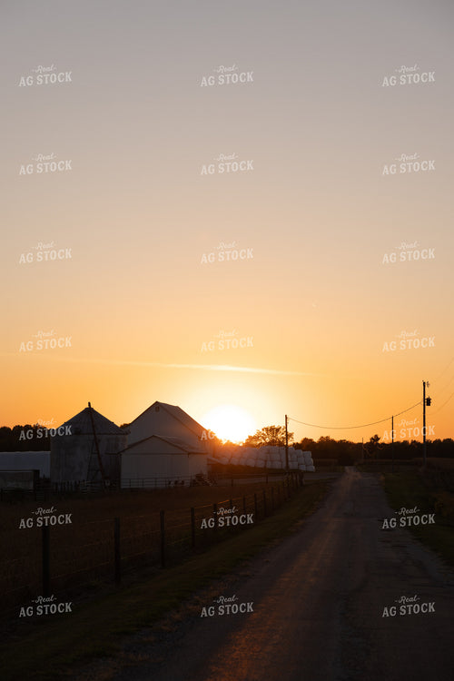 Farm Alongside Country Road at Sunset 178079