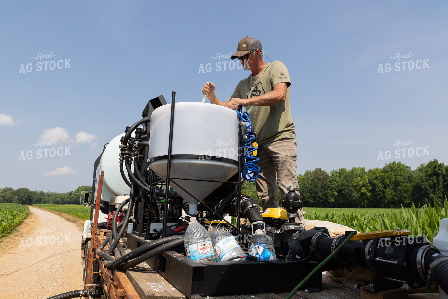 Farmer Mixing Chemicals 79823