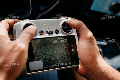 Farmer Holding Drone Controller 196331