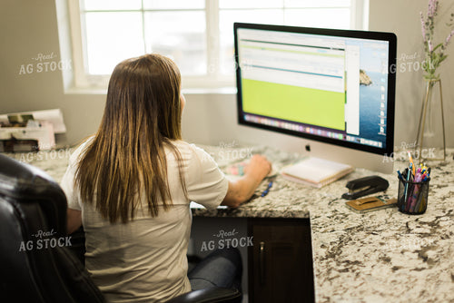 Woman Farmer Works on Computer in Office 7505