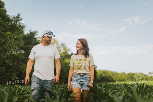 Farmer and Farm Wife Checking Corn 8738