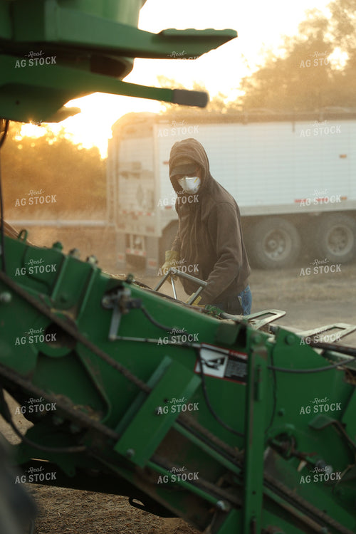 Farmer Blowing out Combine 114094